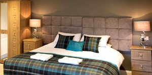 Boutique-style bedroom at Templehall Hotel, Morebattle